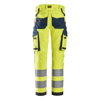 Spodnie robocze spawalnicze odblaskowe stretch, EN ISO 20471 kl. 2 Snickers ProtecWork 6368 – tył